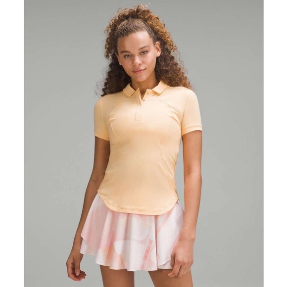 lululemon athletica Tops - NWT Lululemon Quick-Drying Short-Sleeve Polo in Summer Glow Sz. 12